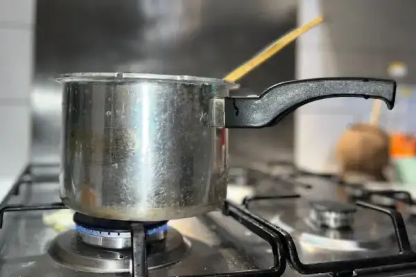 closeup of a small Pressure Cooker in stove